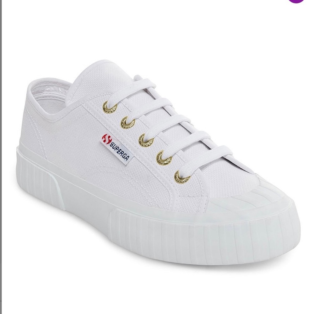 Superga white and gold sneakers.